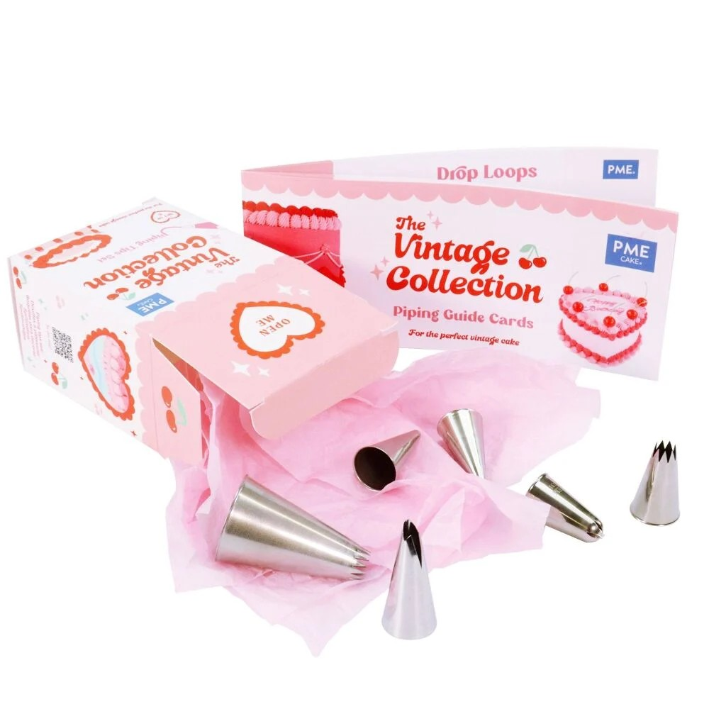 Baking accessories including piping tips and guide cards on a white background